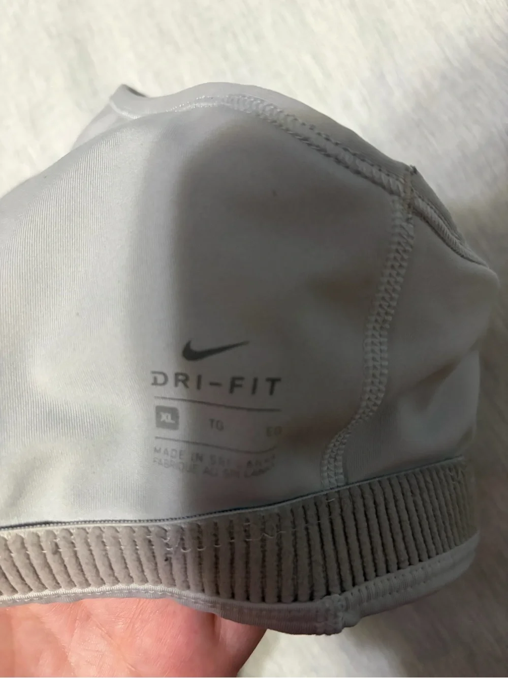 Nike Women's Light Gray Sports Bra with Black Swoosh